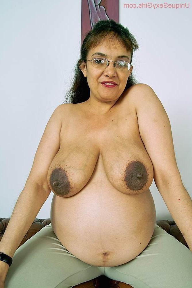 16P busty preggo mature in pantyhose milking her boobs