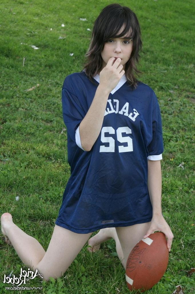 16P Football loving teen girl outdoors