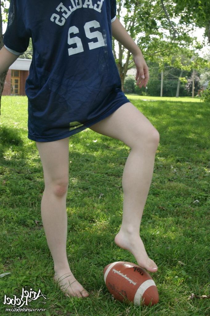 16P Football loving teen girl outdoors