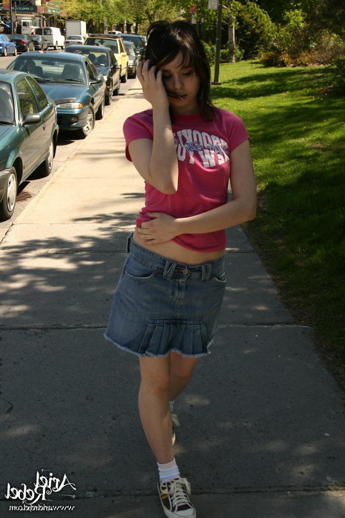 16P Teen in short skirt outdoors