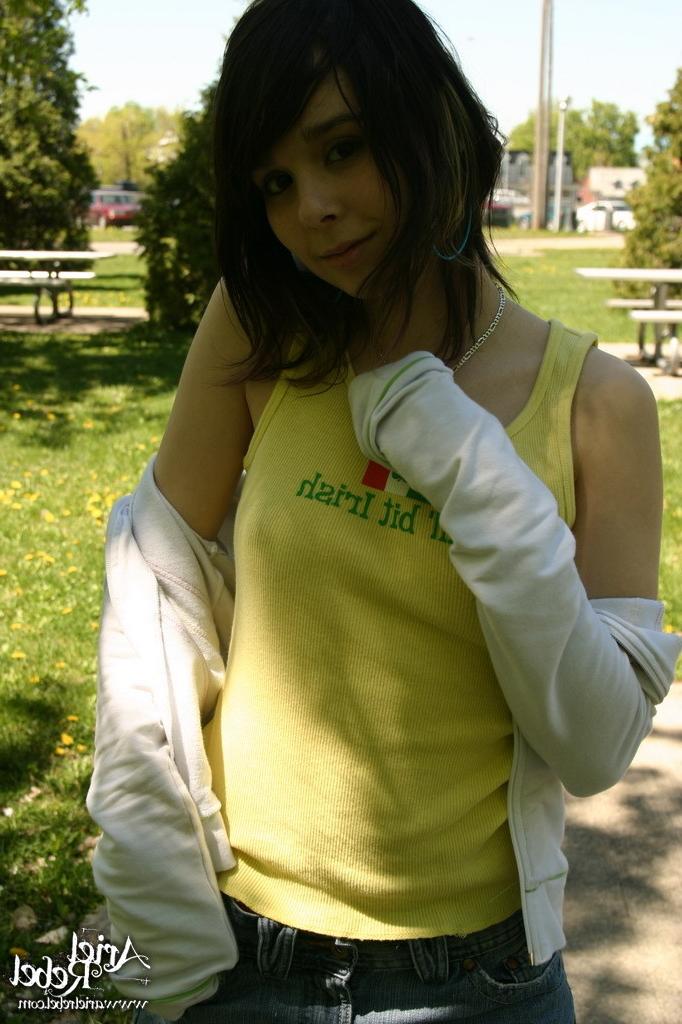 16P Teen wearing short jean skit in park