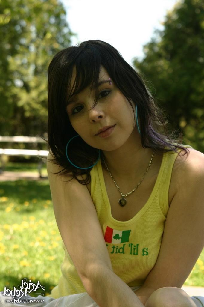 16P Teen wearing short jean skit in park
