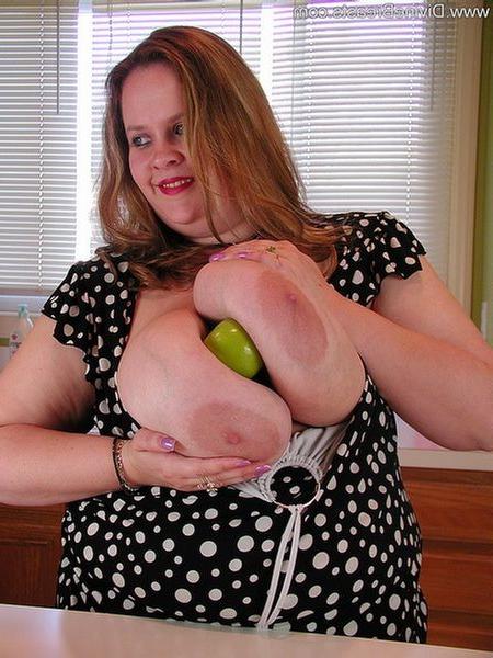 15P Huge boobs plumper showing off what her melons can do