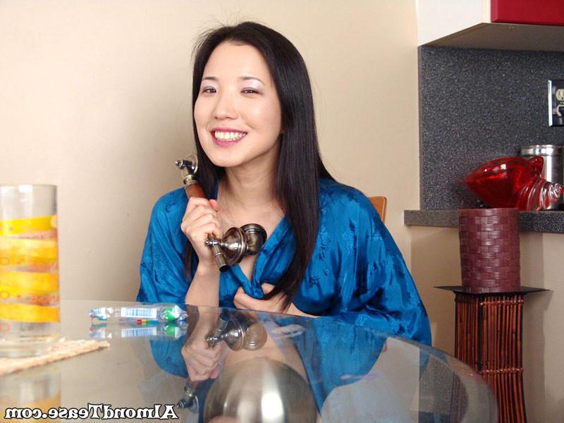 14P Asian Almond Tease flashes her boobies
