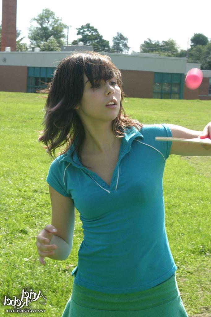 16P Sporty teen girl in skirt outside