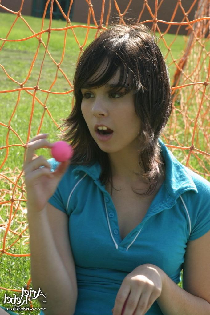 16P Sporty teen girl in skirt outside
