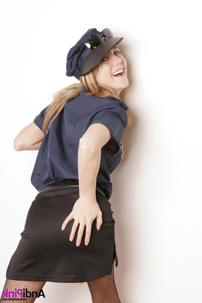 16P Cute teen girl in police uniform