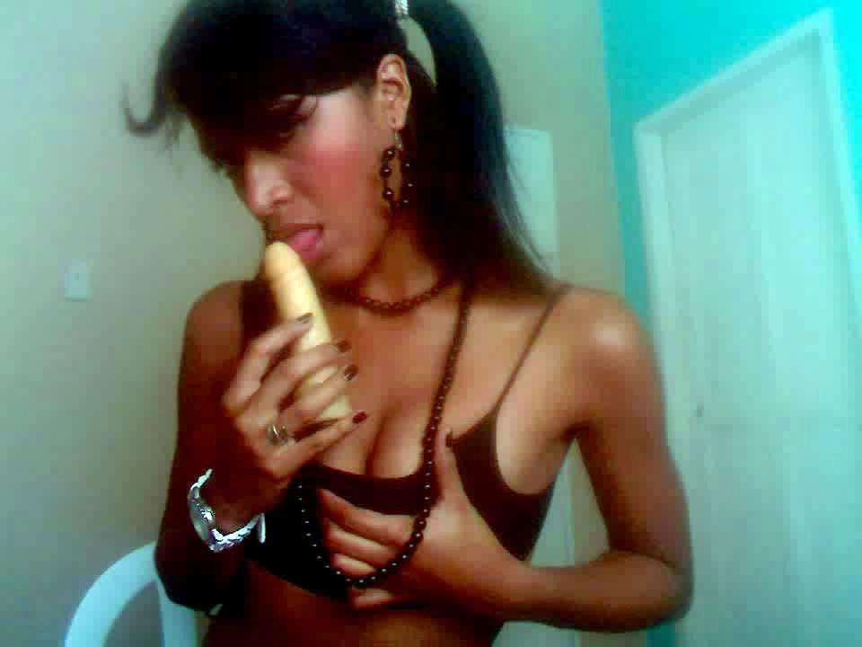 10P Horny brunette lacey sucks a banana off in these hot bangin lingerie pics
