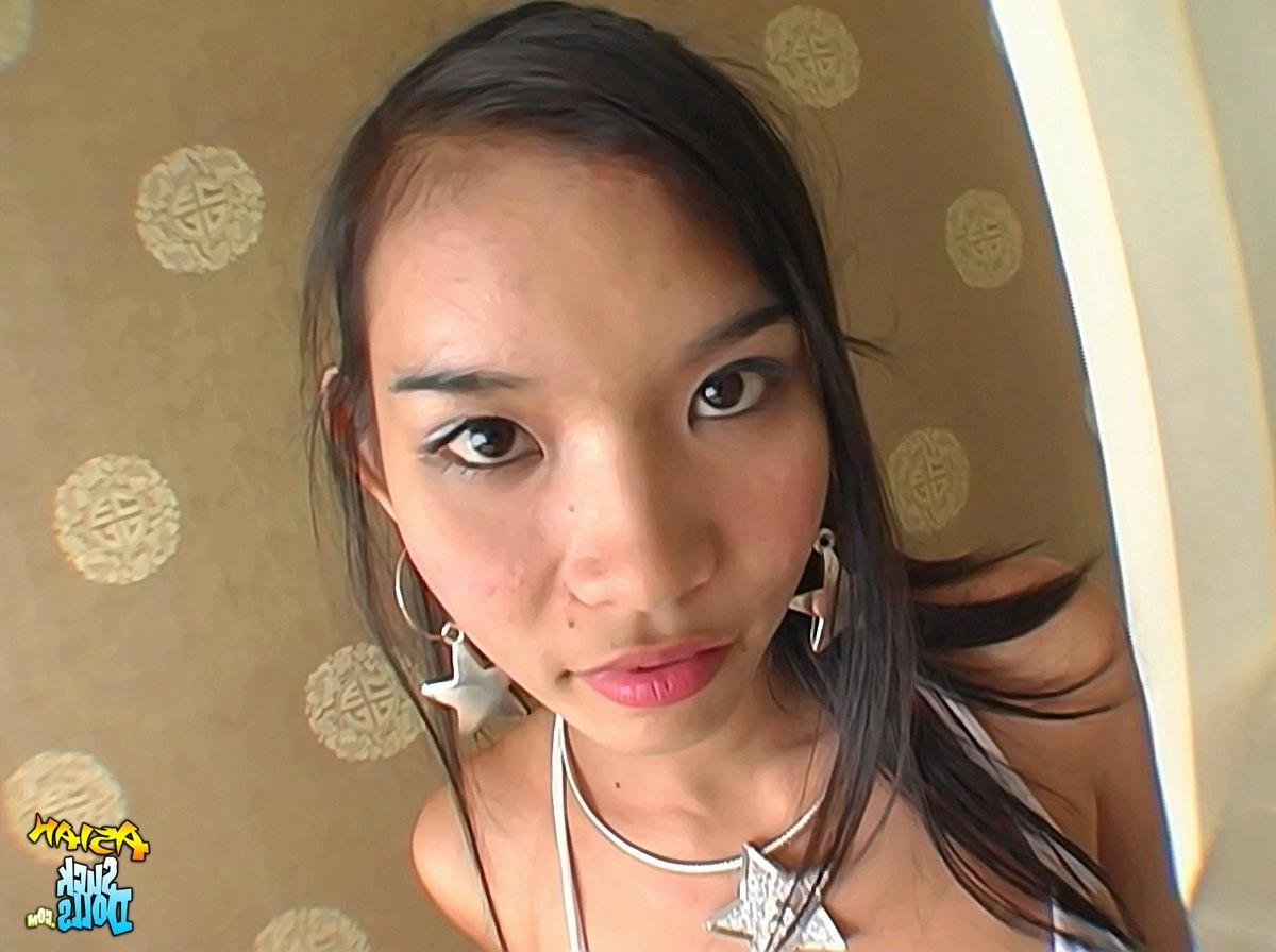 15P Exotic Thai slut Kip services a white cock