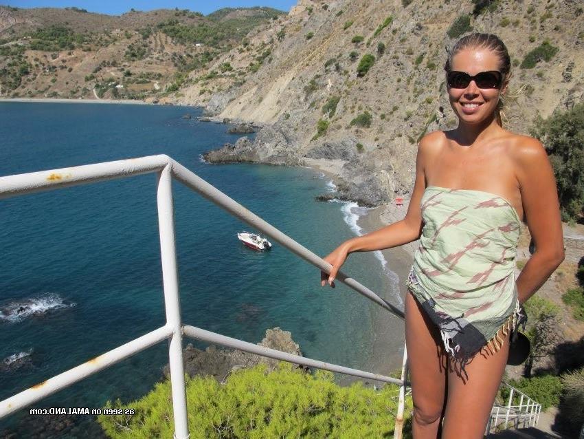15P Amateur Latina GF sunbathing on nude beach with pebbles on pussy