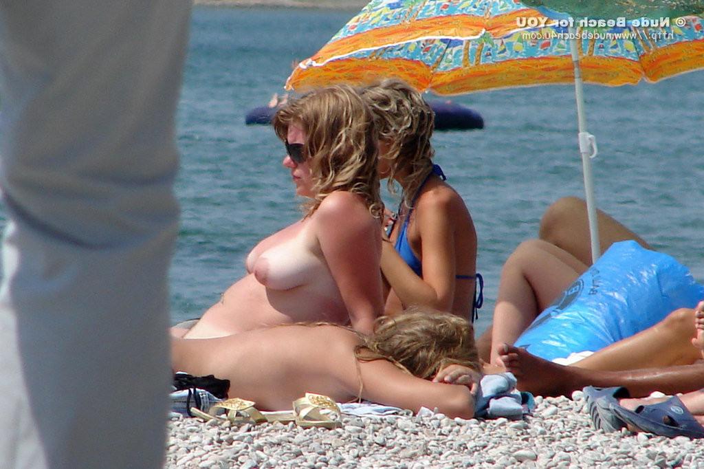 16P Sexy nudists sunbathing