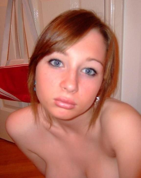 16P Innocent-looking babe getting naked