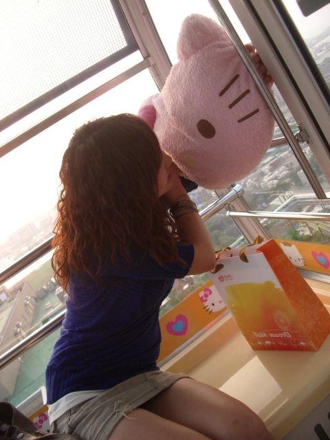 15P Innocent teen stripping on a Hello Kitty ferris wheel