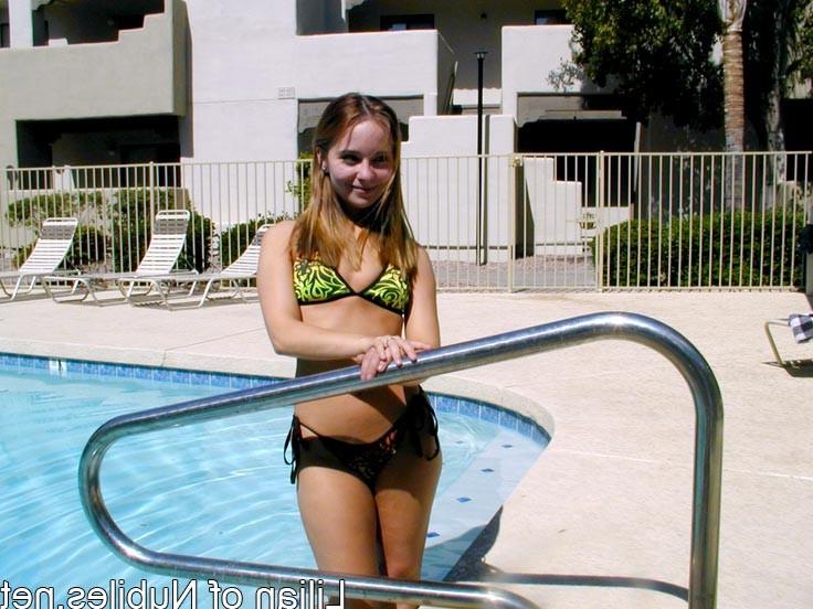 15P Sexy teen gets all wet in the swimming pool
