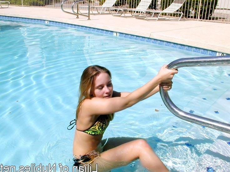 15P Sexy teen gets all wet in the swimming pool