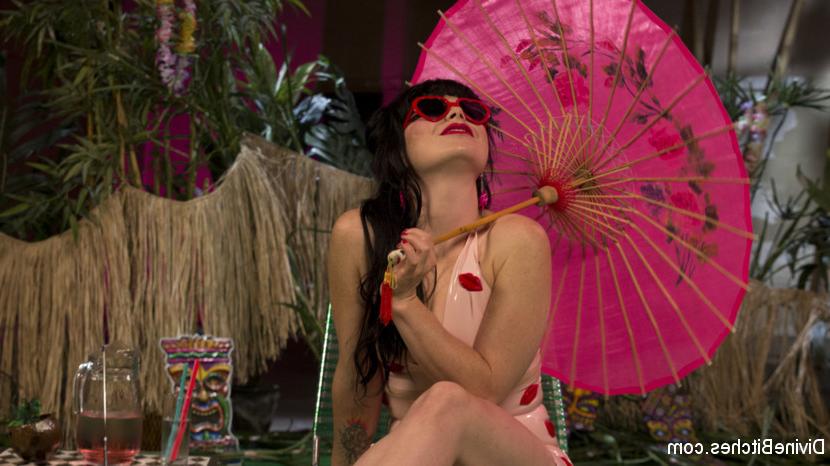 15P Summer is coming round the bend and latex-clad Siouxsie Q decides to tan by the 