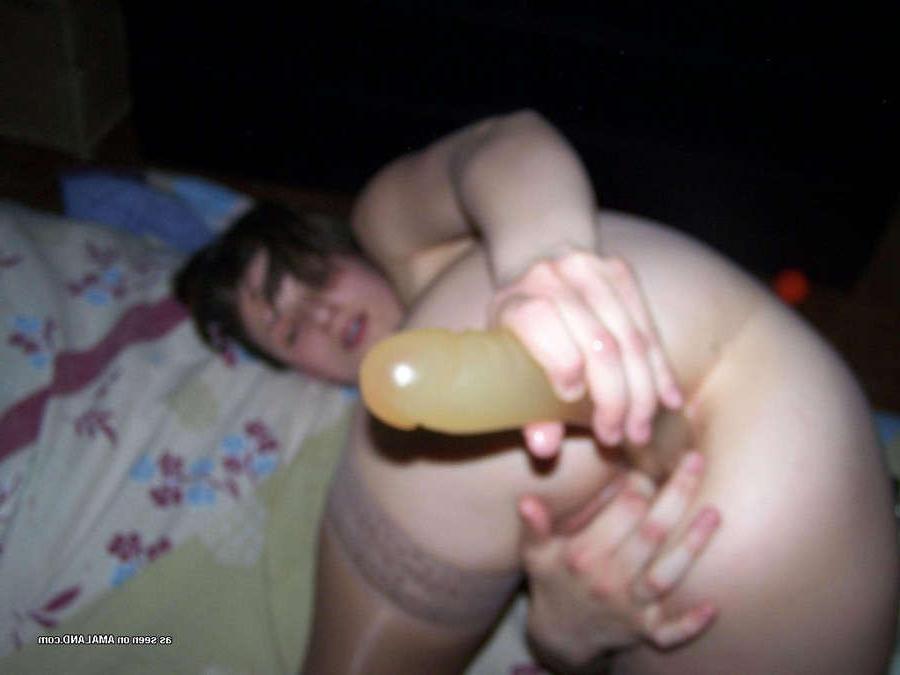 15P Pictures of a wild babe with a huge dildo in her tight butthole 