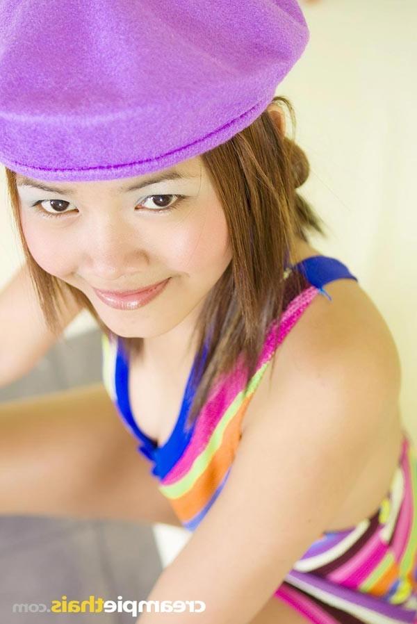 15P Nam shows her long legs and her tiny pussy