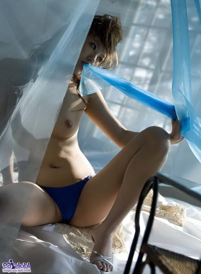 15P Lovely ethnic babe Miyu Sakurai poses showing tits