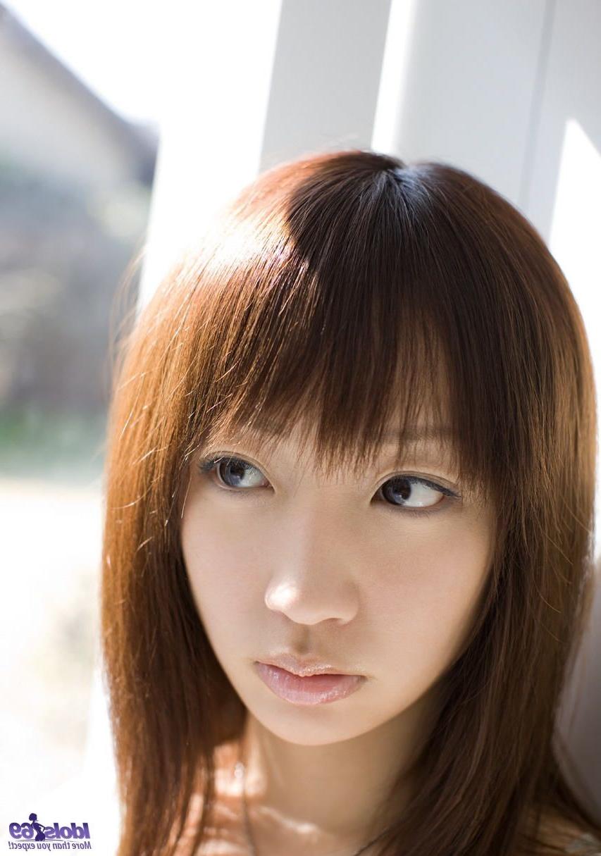16P Cute innocent teen model shyly smiles