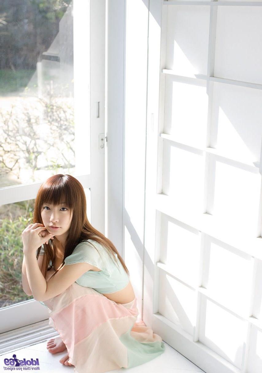 16P Cute innocent teen model shyly smiles