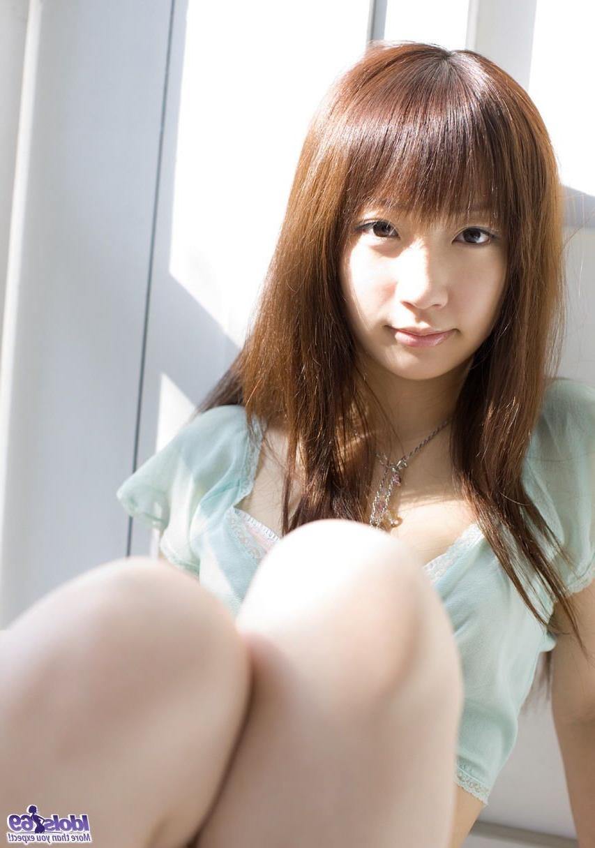 16P Cute innocent teen model shyly smiles