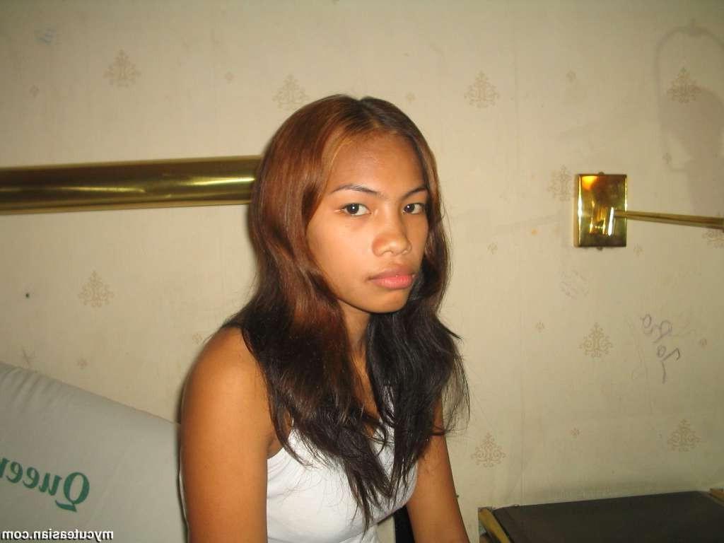 15P Cute oriental teen posing