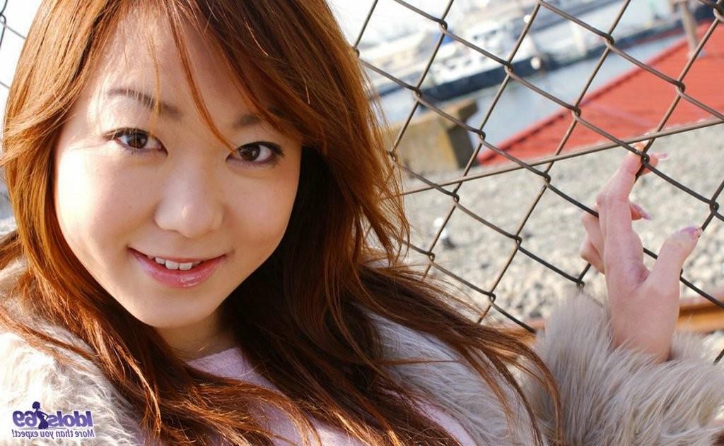 15P Japanese nearly naked showing her tits and pussy to the window