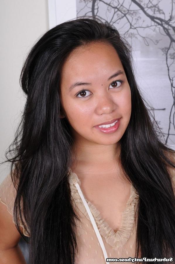15P Innocent looking Asian babe posing sexy in her nude pantyhose