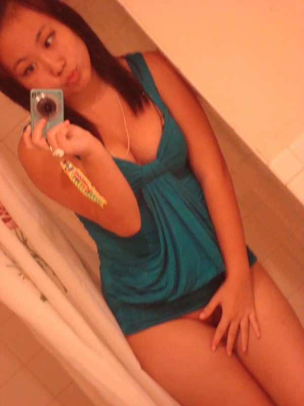 16P Asian cutie with big natural tits posing for the camera