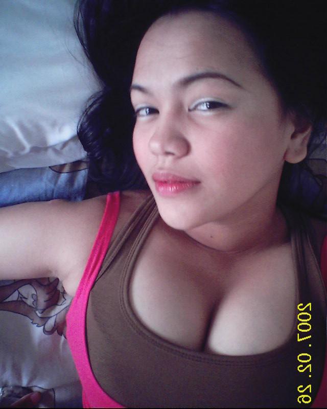 16P Asian cutie with big natural tits posing for the camera