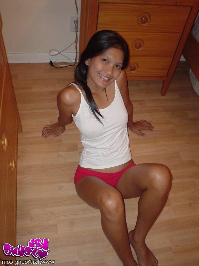 12P Exotic Cutie Kat gets frisky playing and posing on her bed