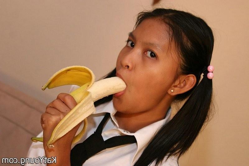 15P Kat is cute exotic thai schoolgirl sucking banana