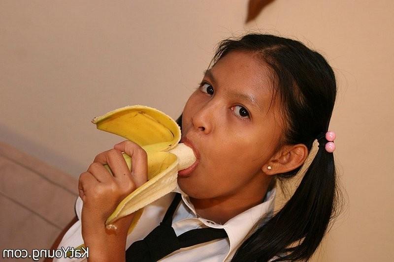 15P Kat is cute exotic thai schoolgirl sucking banana