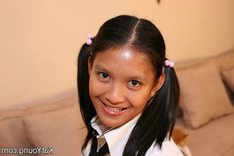 15P Kat is cute exotic thai schoolgirl sucking banana