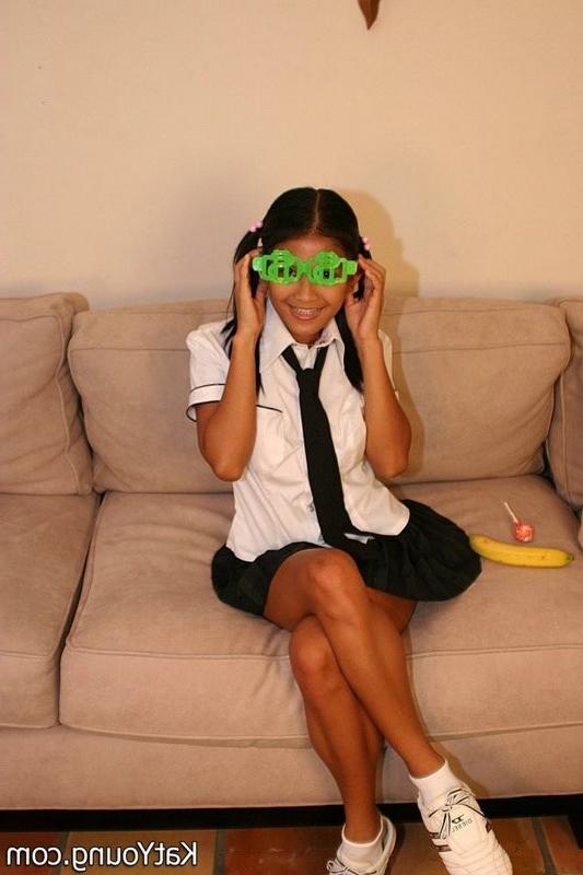 15P Kat is cute exotic thai schoolgirl sucking banana
