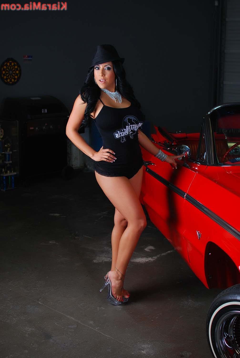 15P Sexy Chicana Kiara Mia poses next to this Low Rider. She gets so hot and horny s