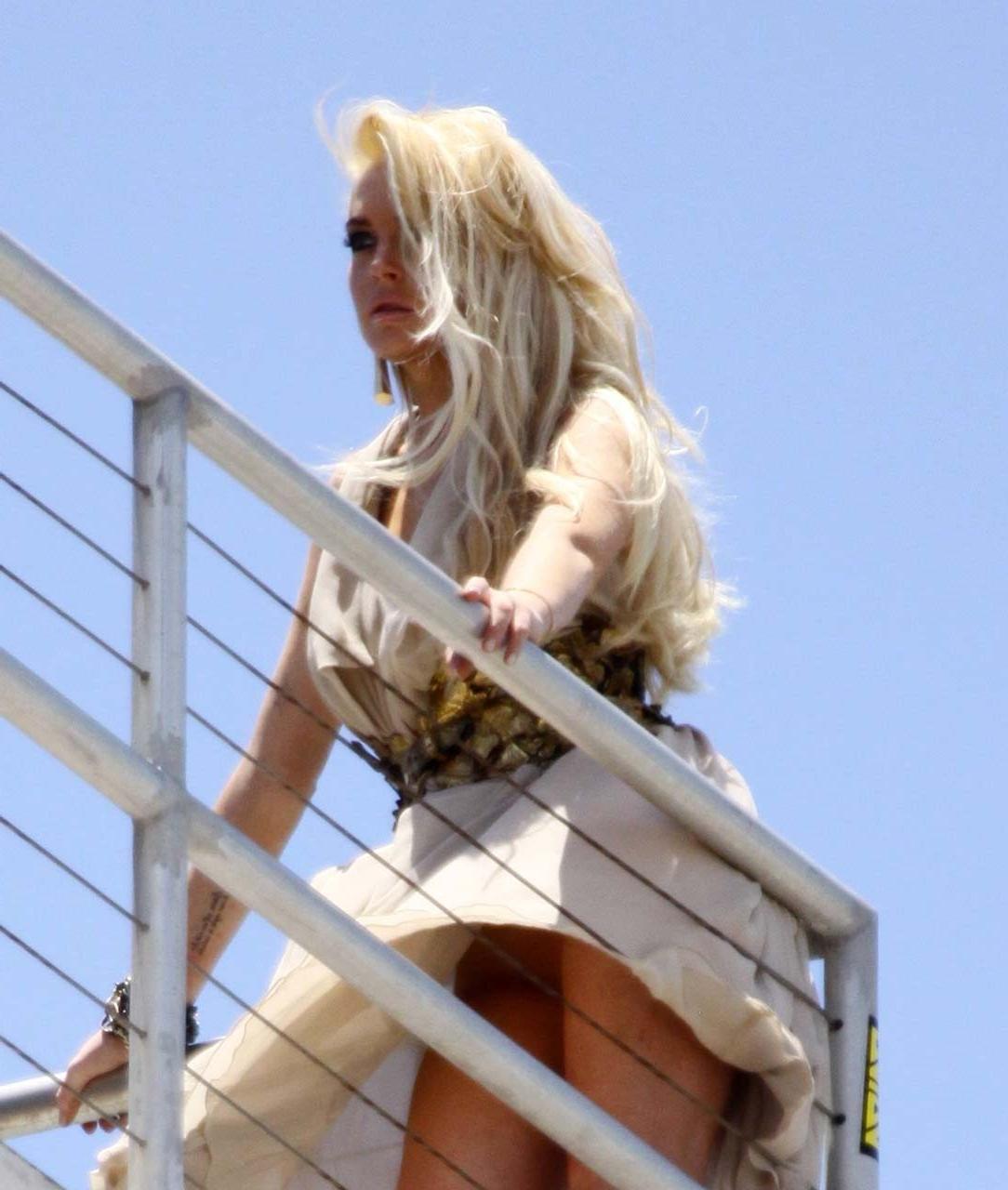 16P Lindsay Lohan very sexy and hot boob slip and upskirt paparazzi photos