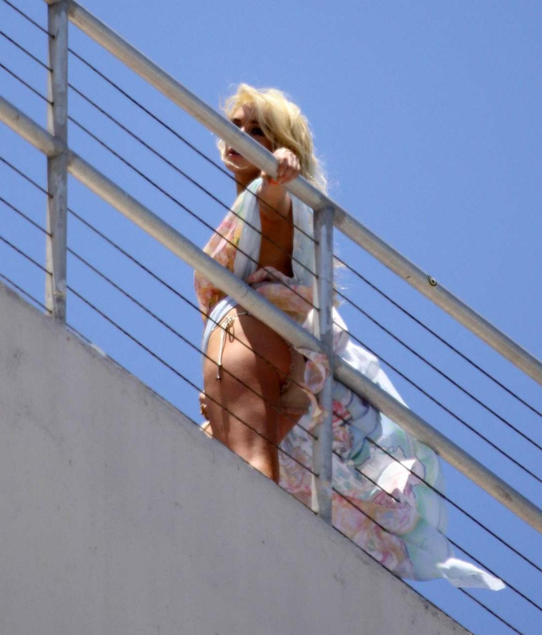 16P Lindsay Lohan very sexy and hot boob slip and upskirt paparazzi photos