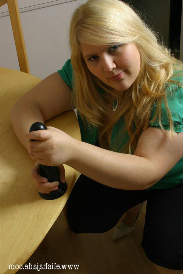 17P Blonde plumper giving a black dildo handjob