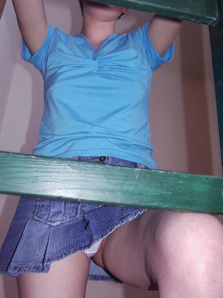 16P Upskirt panty view of babe in short denim skirt wiping the dust