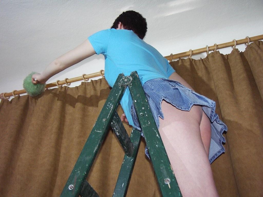 16P Upskirt panty view of babe in short denim skirt wiping the dust