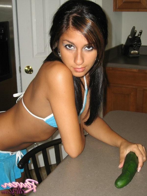 15P brunette babe raven plays with a cucumber