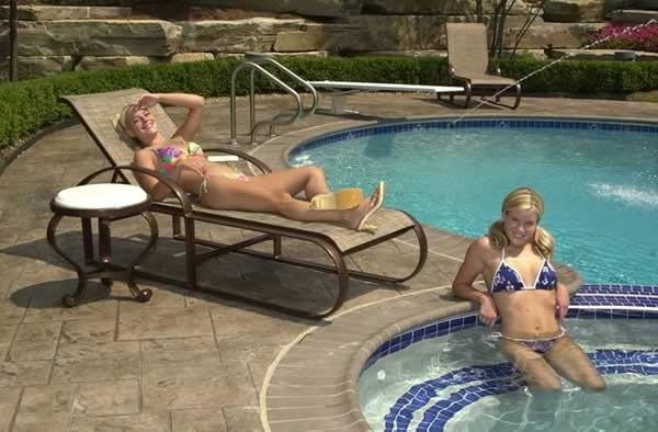 15P Two blonde lesbains in a swimming pool