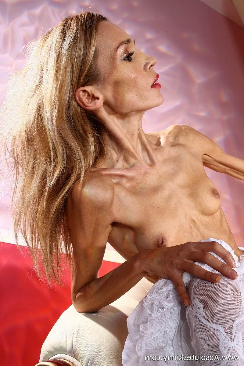 15P anorexic ballerina Inna on a white couch