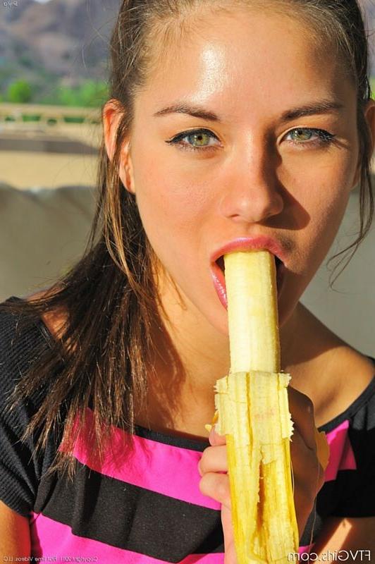 15P Cute amateur girl masturbates with banana and eats it