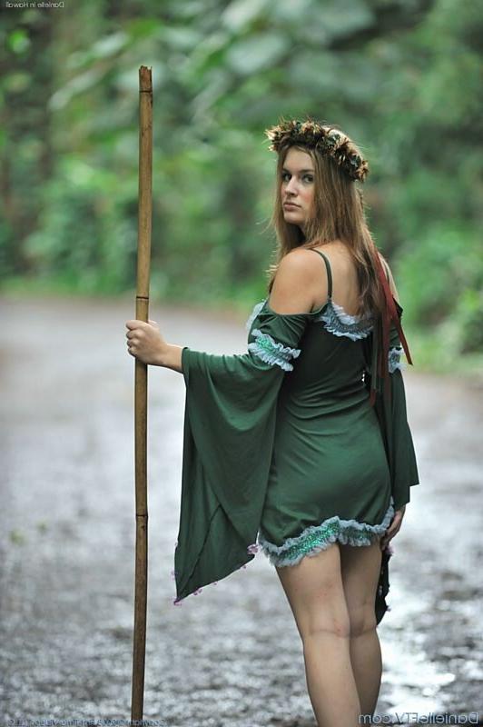 15P Busty renaissance girl prancing in the woods