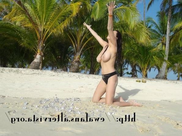 12P Busty Polish centerfold Ewa Sonnet posing on the beach
