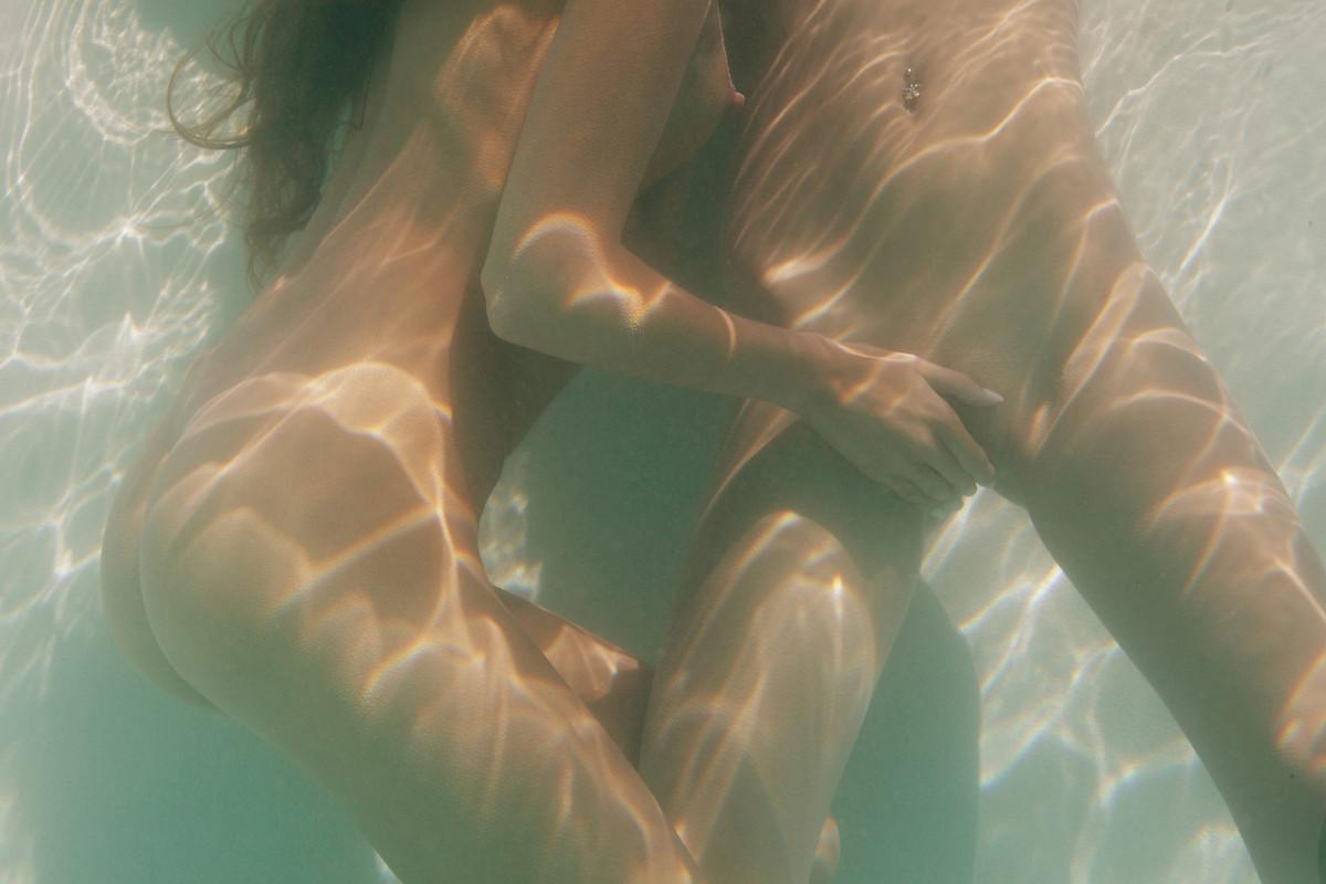 15P Lesbian babes playing naked in the pool