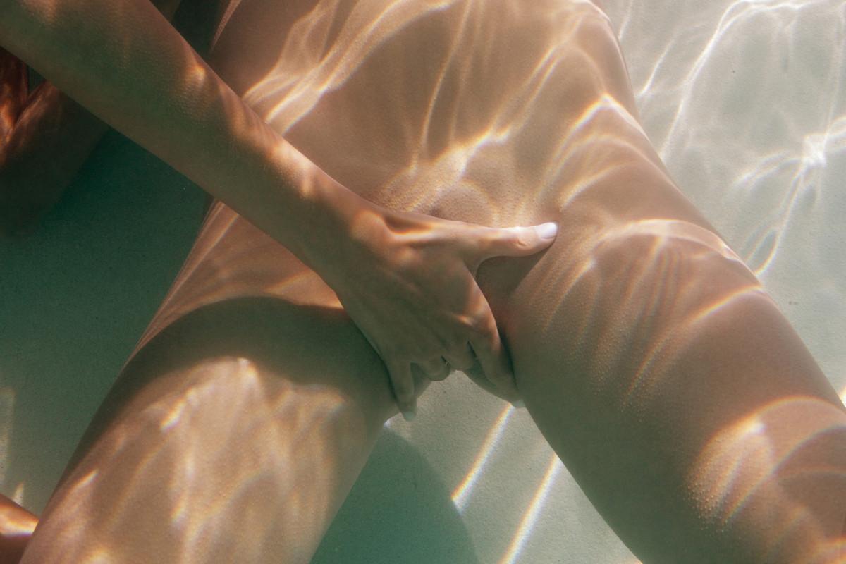15P Lesbian babes playing naked in the pool